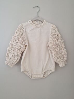 Cream Ruffle Sleeve Infant One-Piece Bodysuit